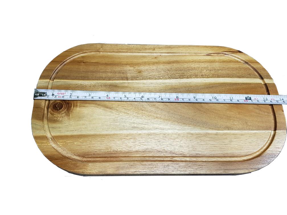 Rounded Cutting Board With Juice