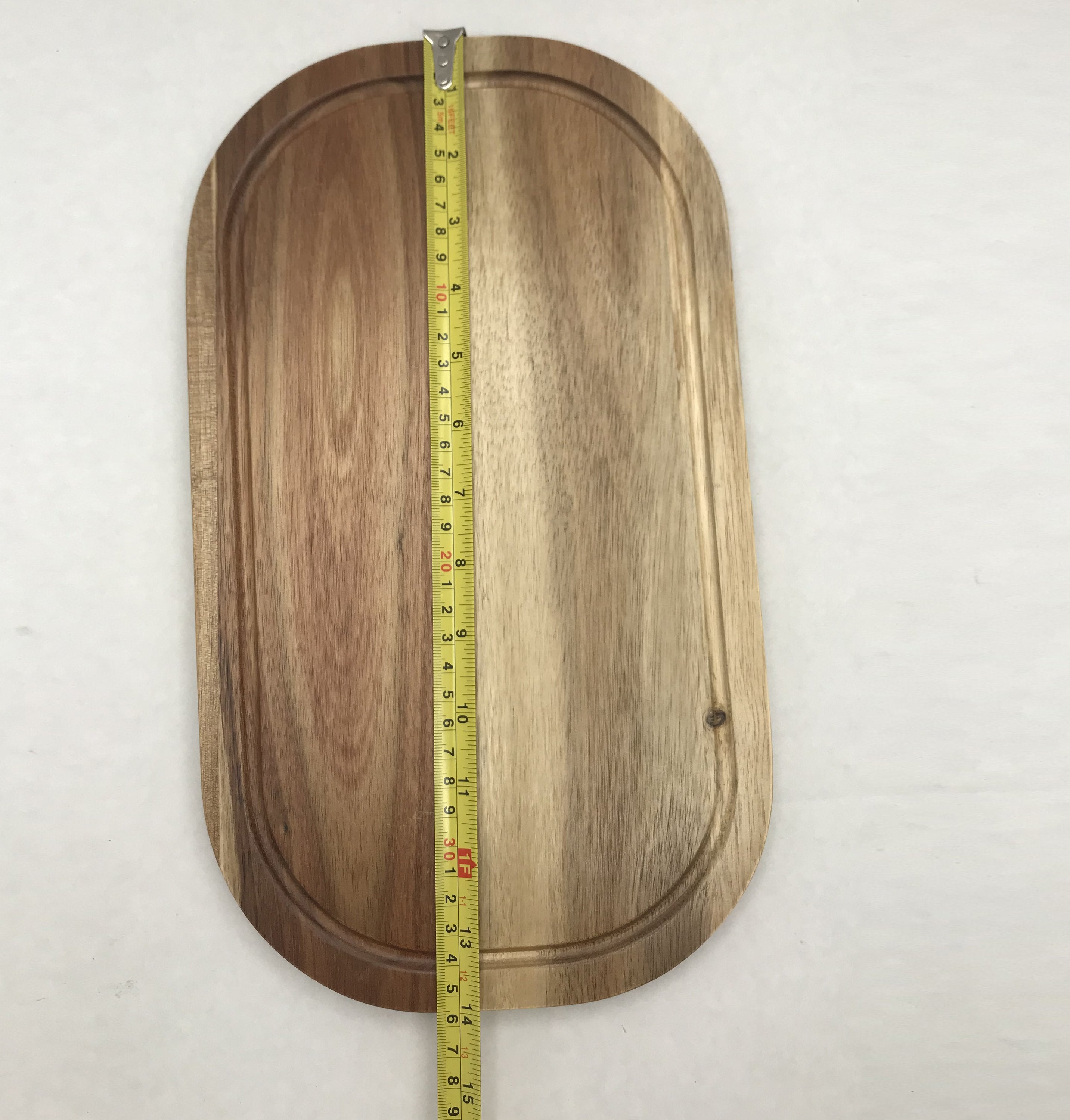 Rounded Cutting Board With Juice